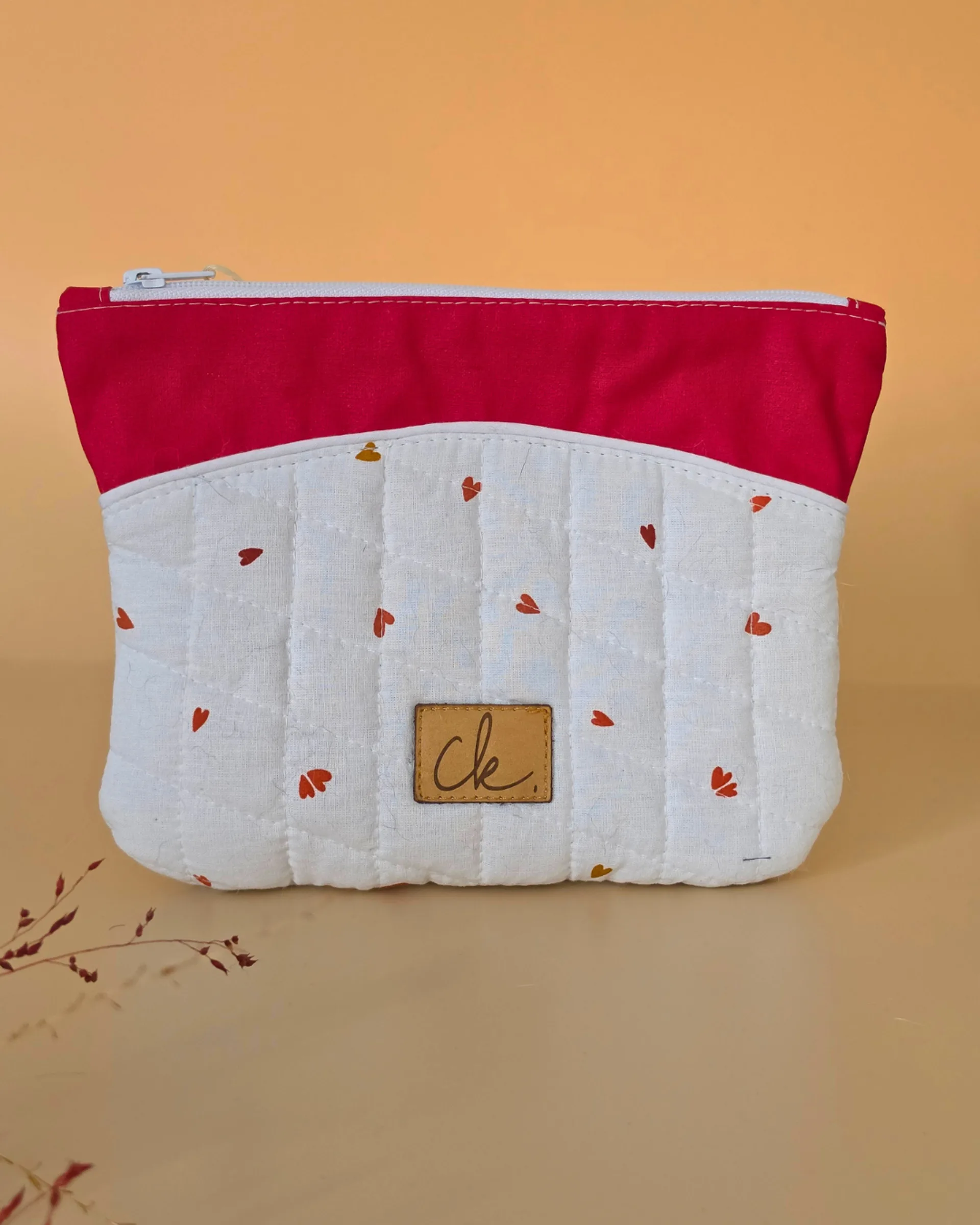 trousse modron matelassée rouge